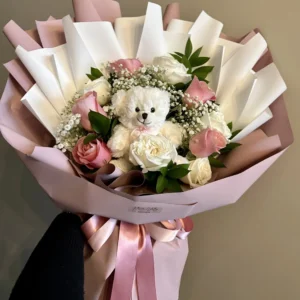 Rose bouquet with teddy bear