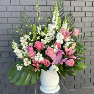 Urn Flower Arrangement. White/Pink