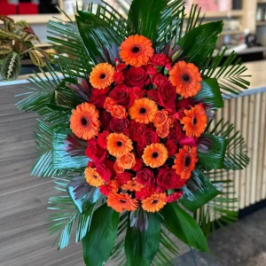 Funeral Spray. Orange & Red.
