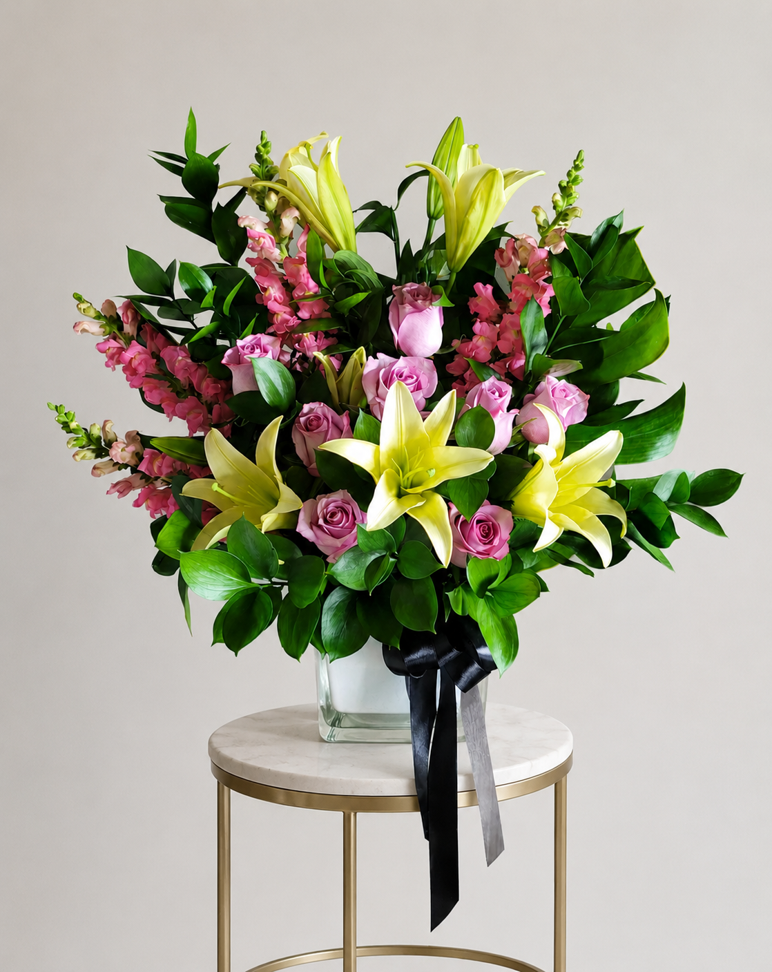 img_5344 funeral sympathies pink & yellow arrangement