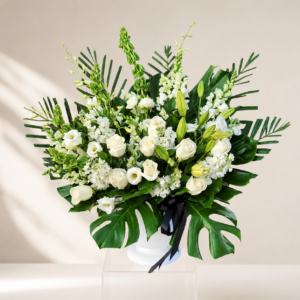 urn flower arrangement. white